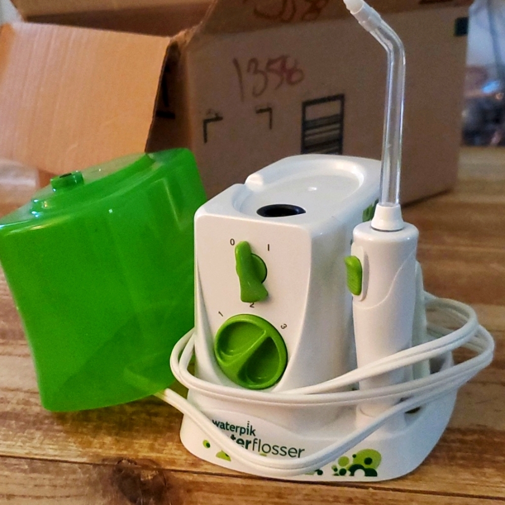 Waterpik waterflosser for kids countertop teeth and braces cleaner green...